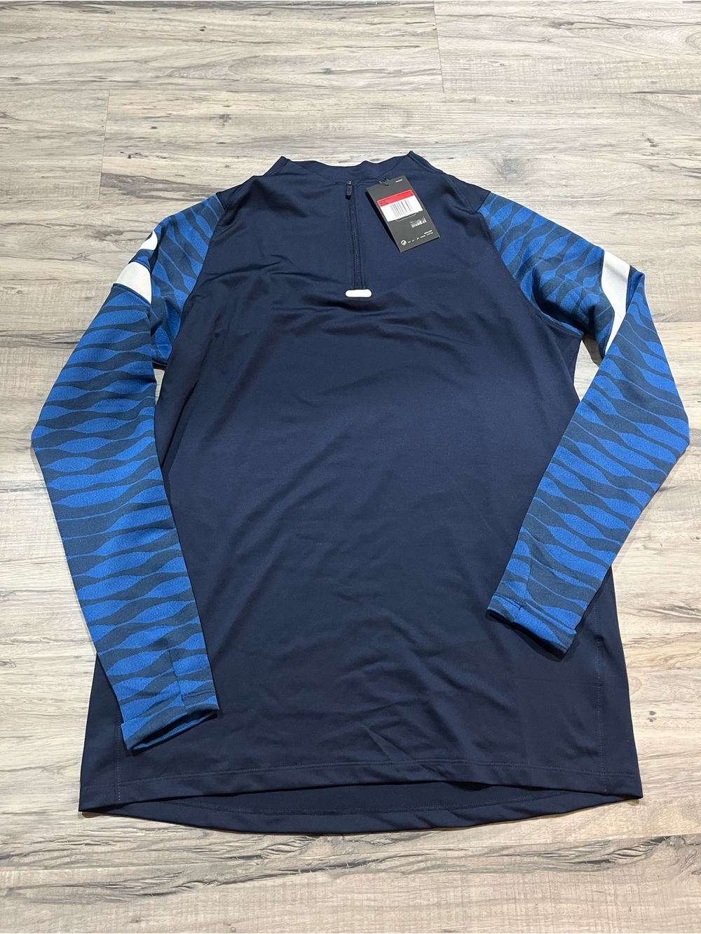 Nike Men's Navy Long Sleeve Top with Blue Patterned Sleeves